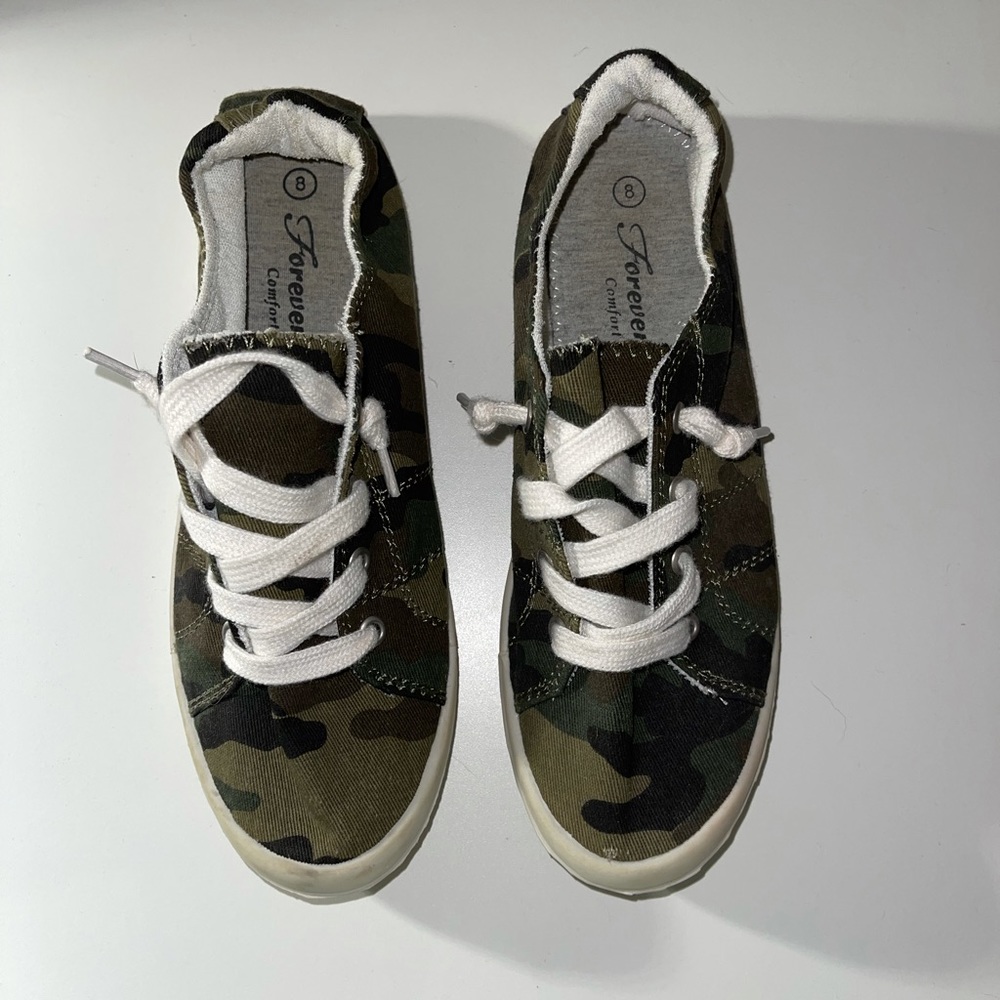 Camo slip on sneakers